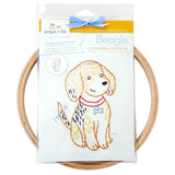 Embroidery wall art kit with a beagle design on a white background