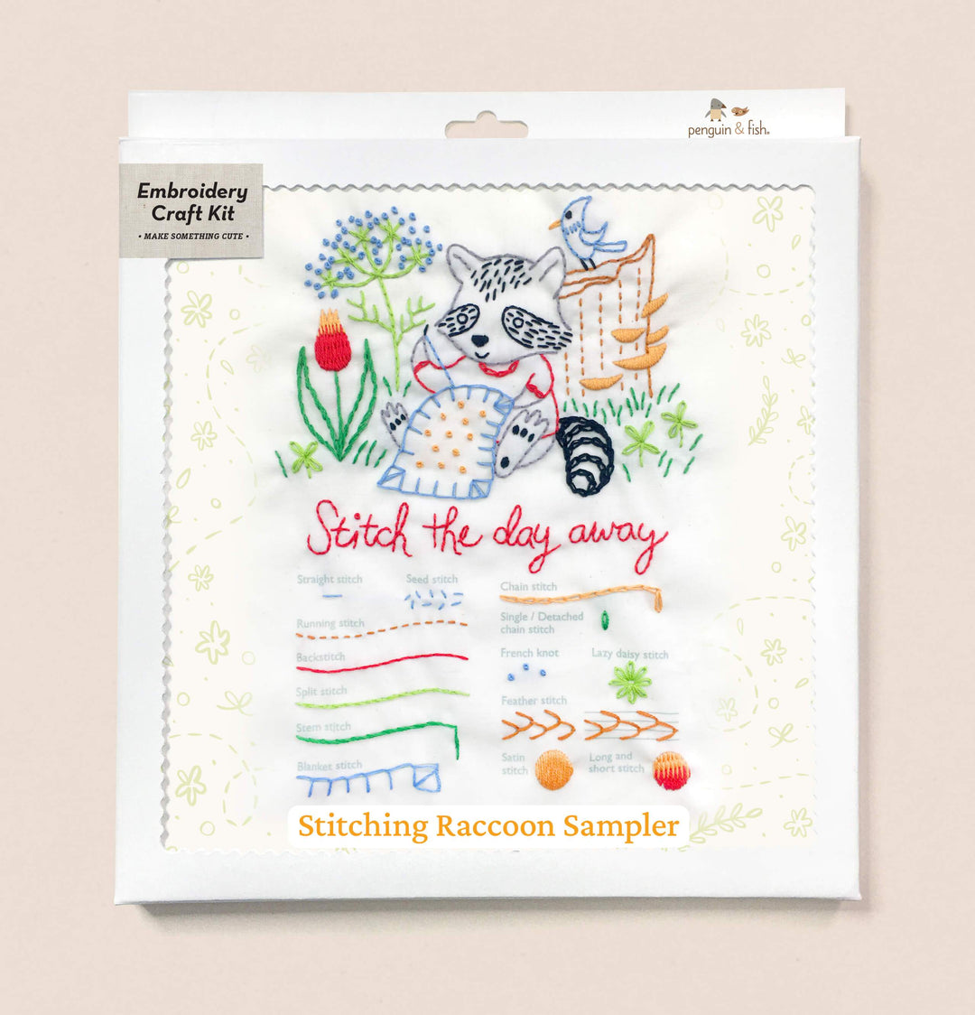Embroidery craft kit packaging with a raccoon design on a beige background