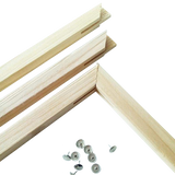 Wooden picture frame components with hardware on a white background