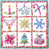 Colorful quilt with various festive designs including stars, trees, and candy canes.