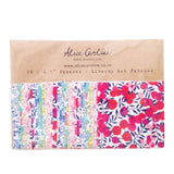 Pack of Liberty Art Fabrics with floral patterns on a cardboard backing, featuring the brand 'Alice Caroline'.