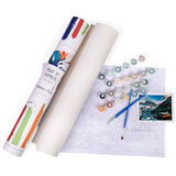Paint by numbers kit with roll of paper, paint bottles, and brush on a white background