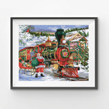 Framed artwork of Santa Claus on a train in a snowy village scene