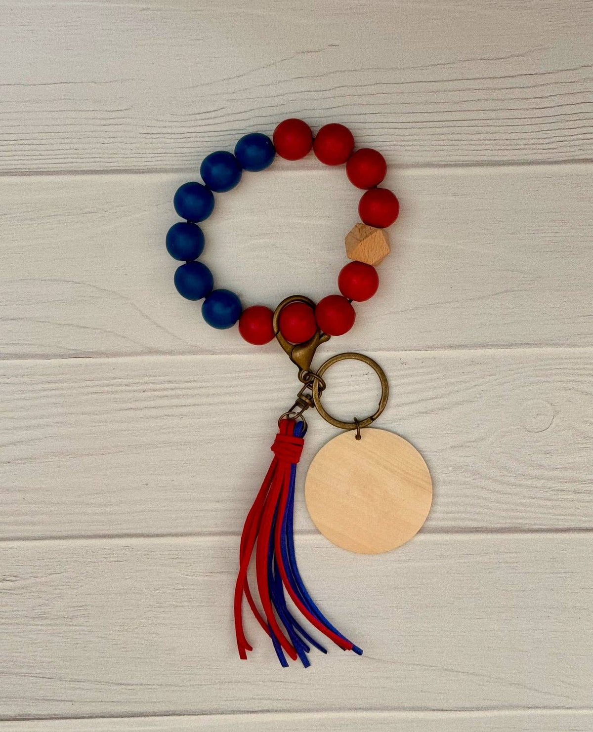 KW Laser Supplies - Royal Blue/Red wristlet - Pisgah Needleworks