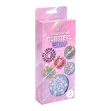 Packaging of diamond painting coasters with colorful mandala designs on a pink background.