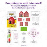 Product packaging with Snoopy and Woodstock images, featuring a doghouse and diamond-themed items on a white background.