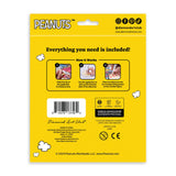 Yellow packaging for a diamond art kit with 'Peanuts' branding and instructions.