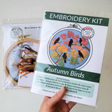 Embroidery kit with 'Autumn Birds' design on a white background