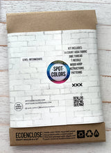 Packaging of Spot Your Colors craft kit with white brick pattern on cardboard
