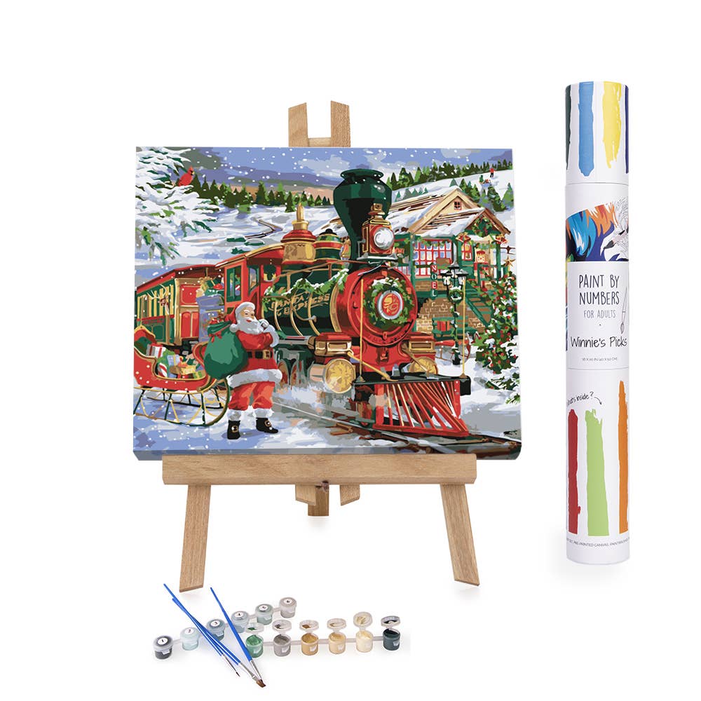 Paint by numbers kit with Santa Claus and a train on an easel