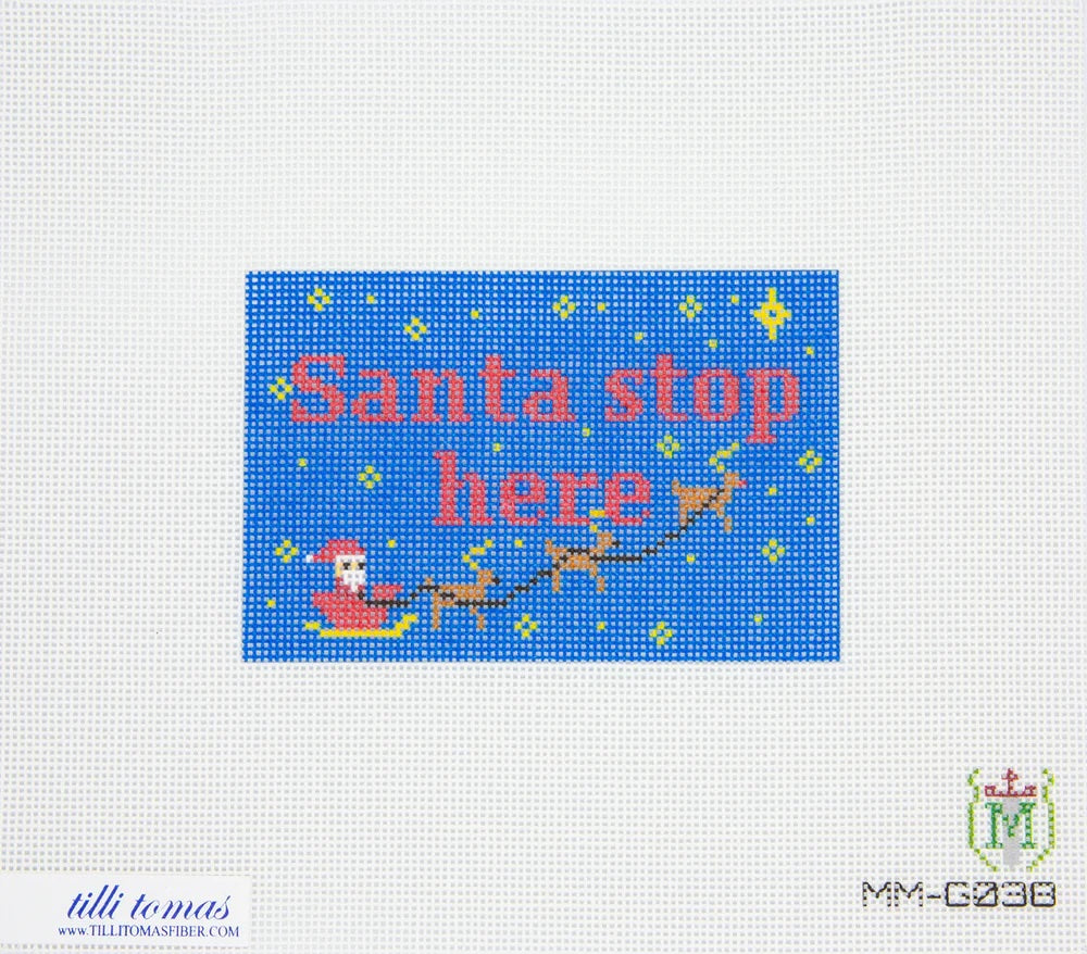 Needlepoint canvas design with a blue background and yellow stars with Santa Claus and three reindeer and the text Santa Stop Here.