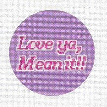 Needlepoint canvas circular design with 'Love ya, Mean it!!' text on a purple background