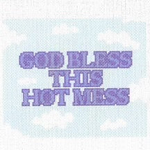 Needlepoint canvas design with text 'GOD BLESS THIS HOT MESS' on a light blue background with pixelated effect