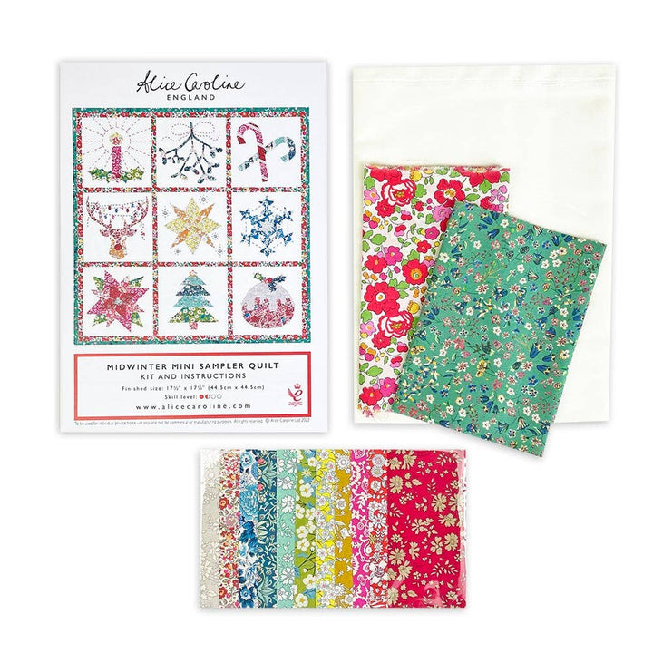 Alice Caroline England fabric sampler kit with colorful patterns on a white background