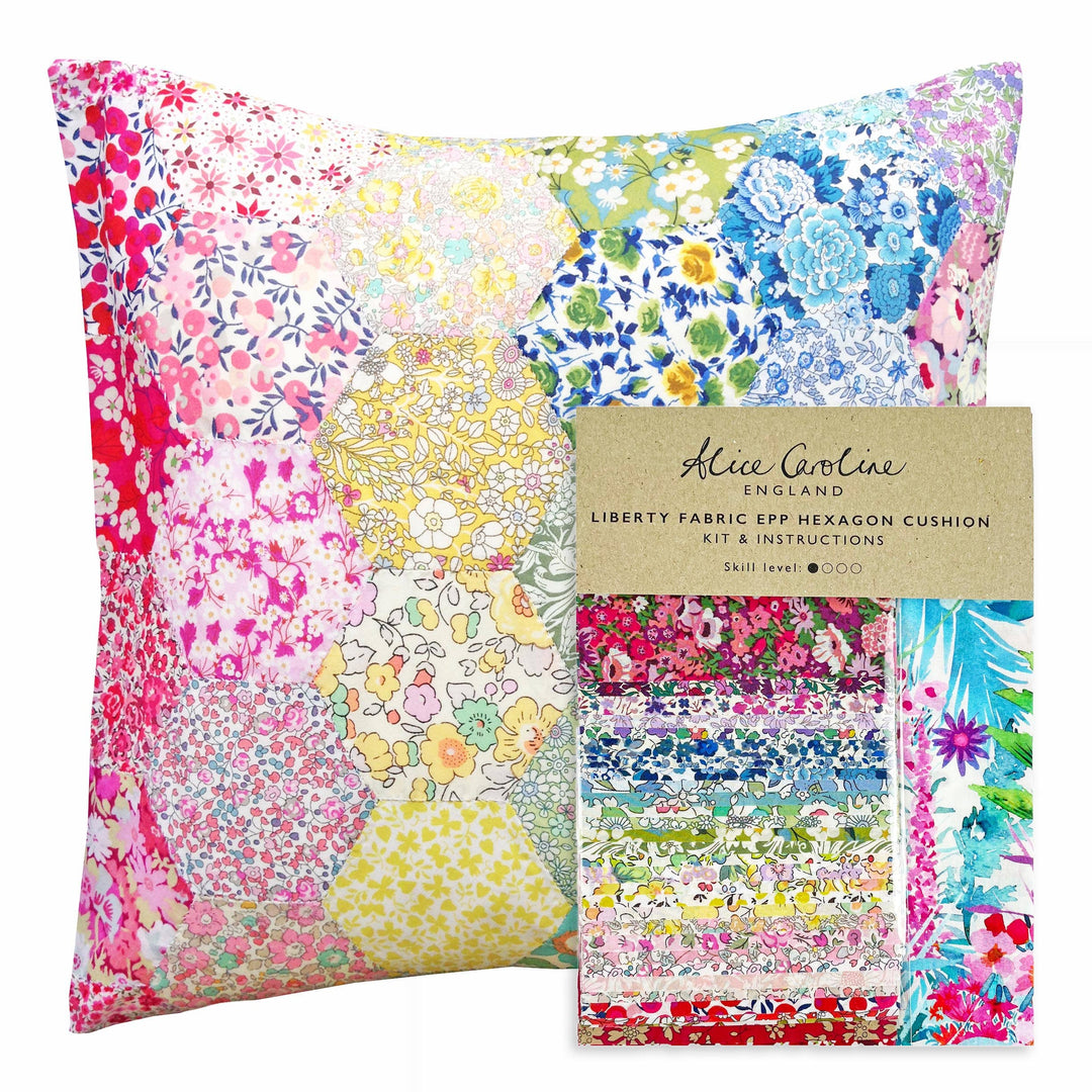 Colorful Liberty fabric epp hexagon cushion kit with packaging on a white background