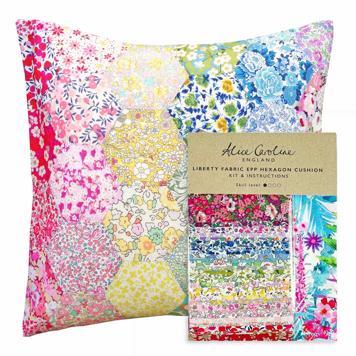 Colorful Liberty fabric epp hexagon cushion kit with packaging on a white background