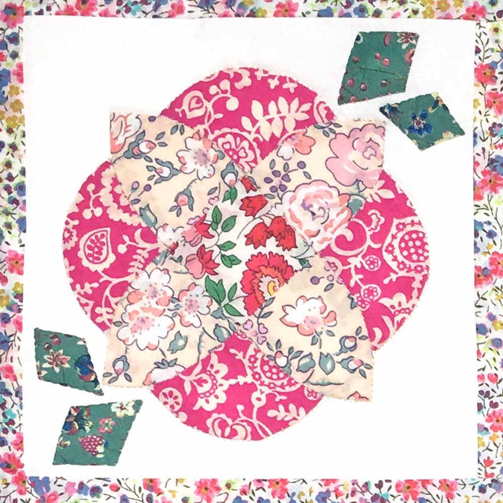 Floral patterned fabric pieces with a colorful border