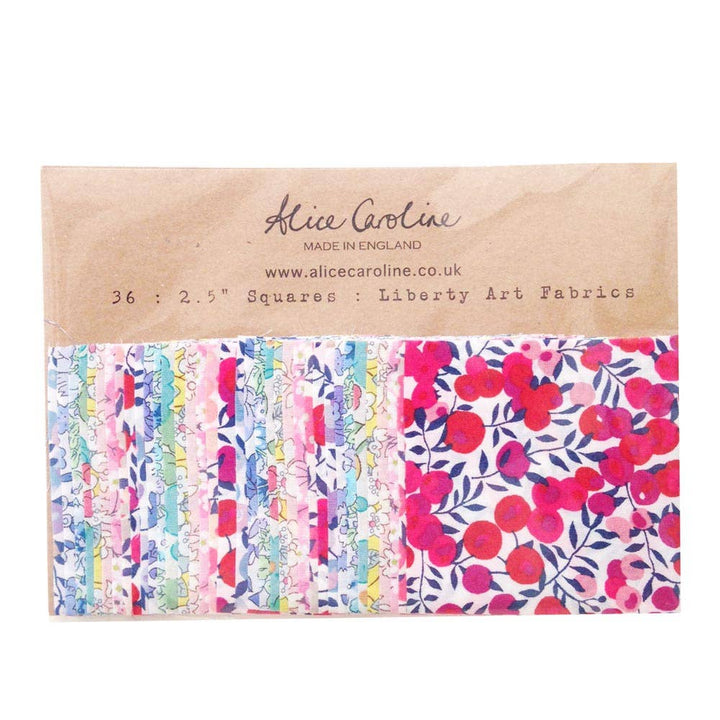 Pack of Liberty Art Fabrics with floral patterns on a cardboard backing, featuring the brand 'Alice Caroline'.