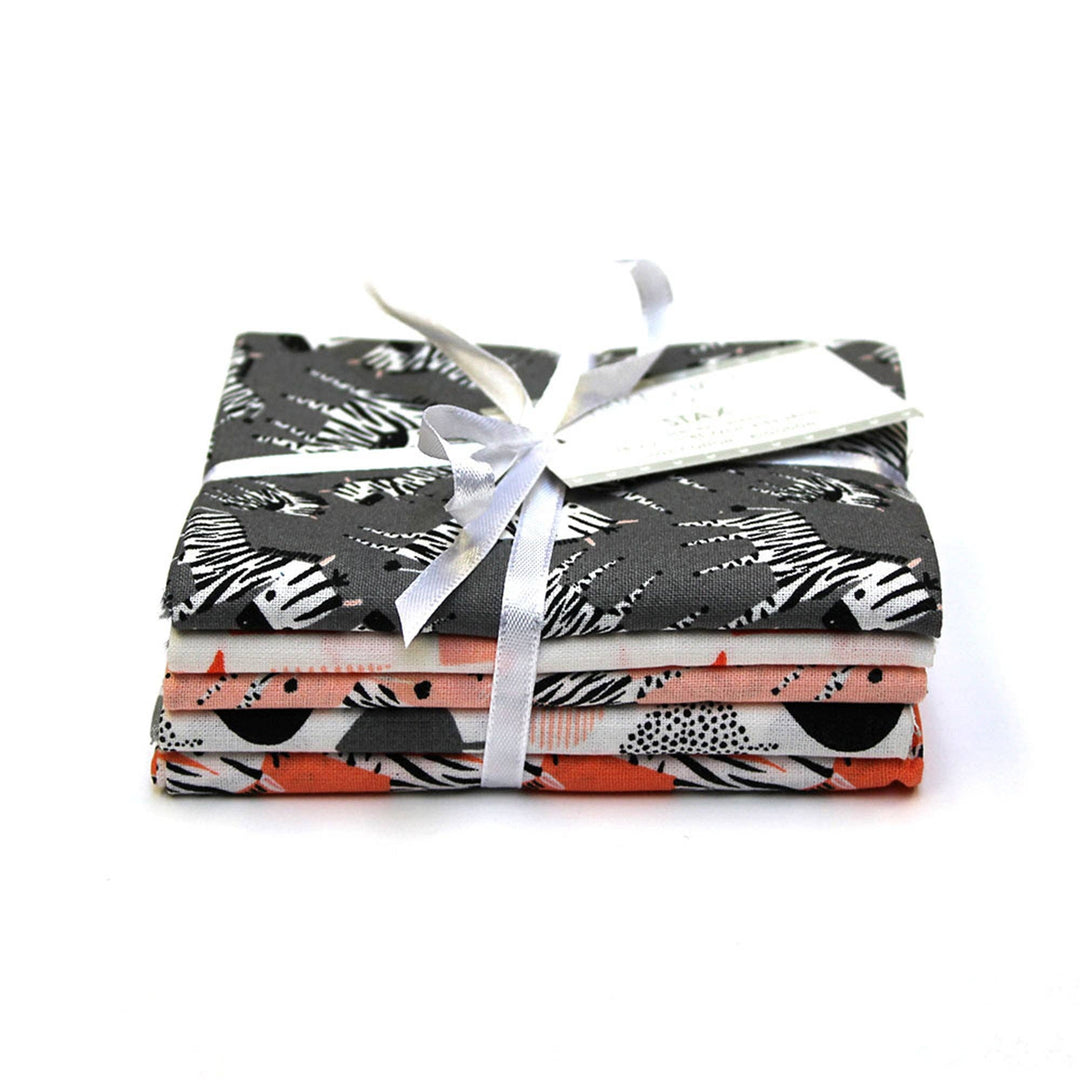 Pack of fabric sheets with a white ribbon on a white background