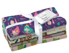 Stack of fabric bundles with colorful designs and a white ribbon on a white background