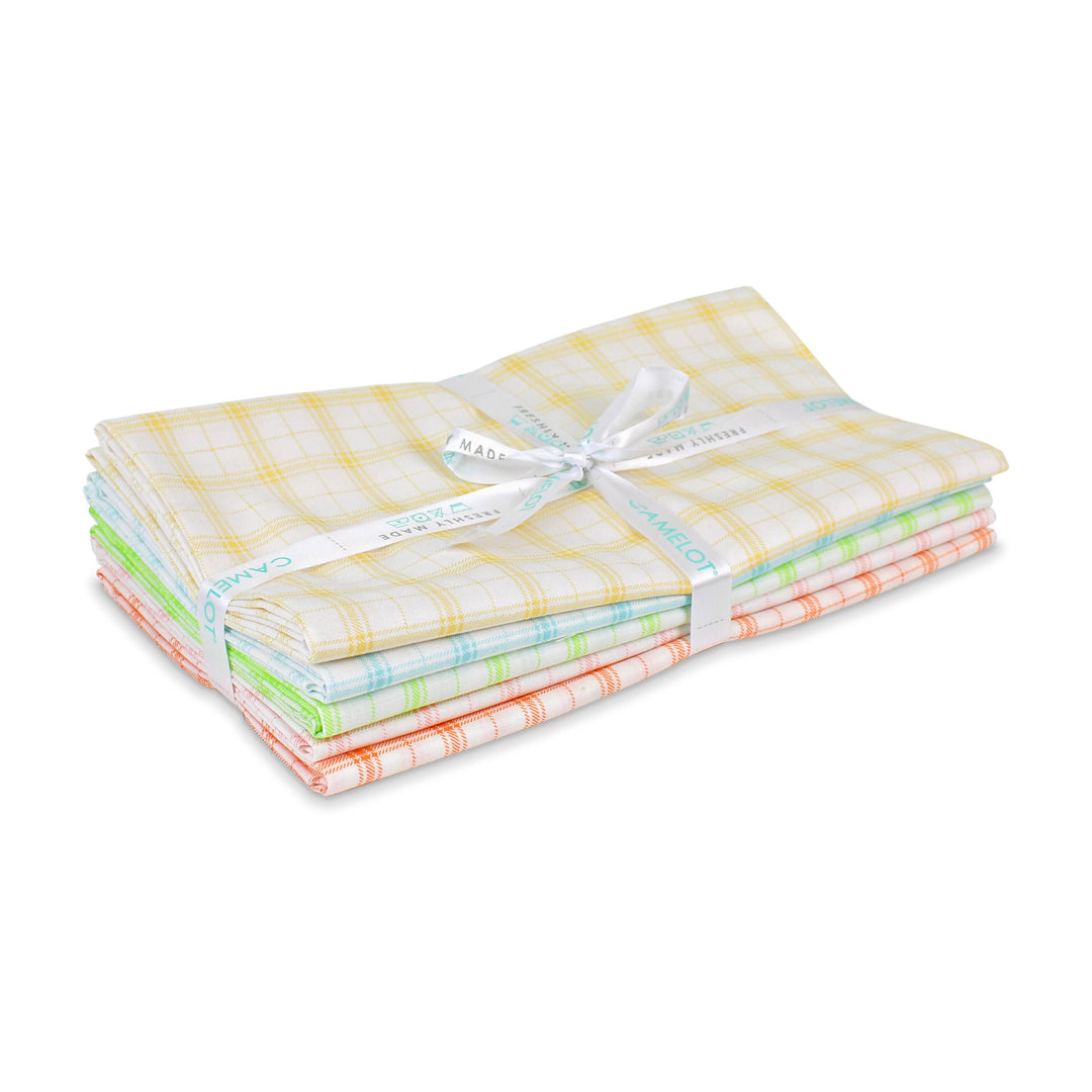 Set of colorful checkered cloths tied with a white ribbon on a white background