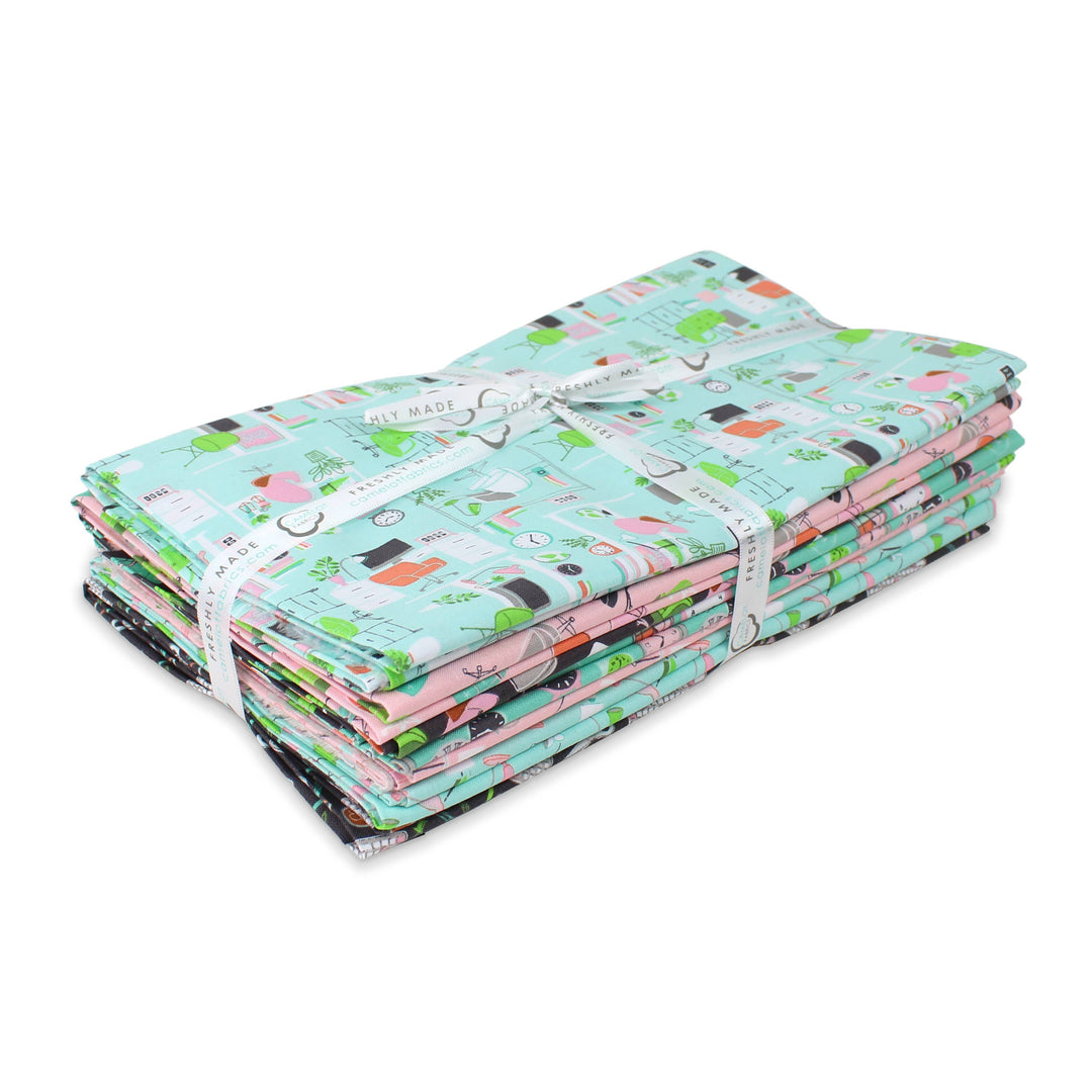 Stack of colorful fabric panels with a pattern on a white background