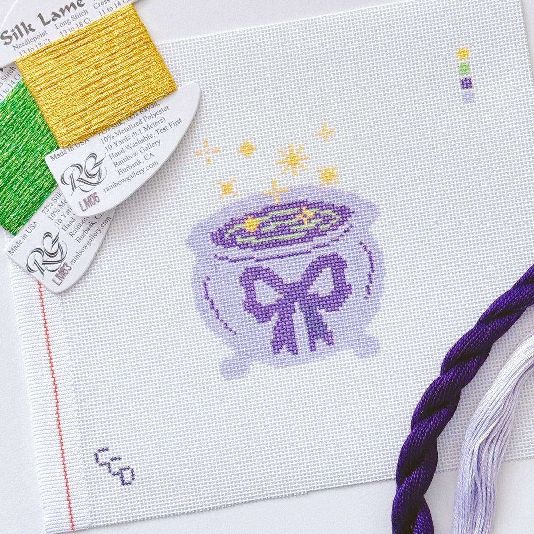 Cotswold Co Designs - Magic Cauldren Halloween Needlepoint Canvas, 18 mesh, 4x4” design, modern trendy needlepoint canvas, bow Halloween needlepoint - Pisgah Needleworks