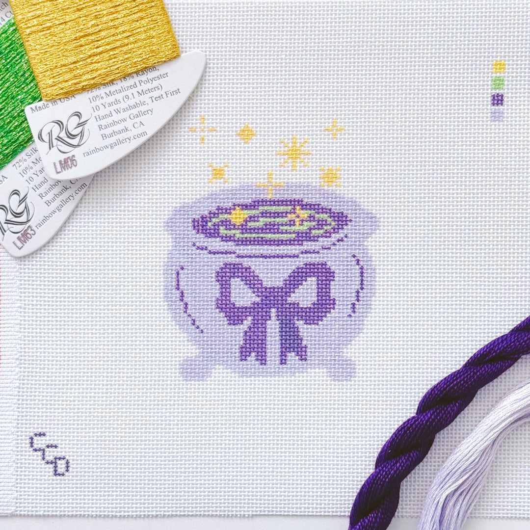 Cotswold Co Designs - Magic Cauldren Halloween Needlepoint Canvas, 18 mesh, 4x4” design, modern trendy needlepoint canvas, bow Halloween needlepoint - Pisgah Needleworks