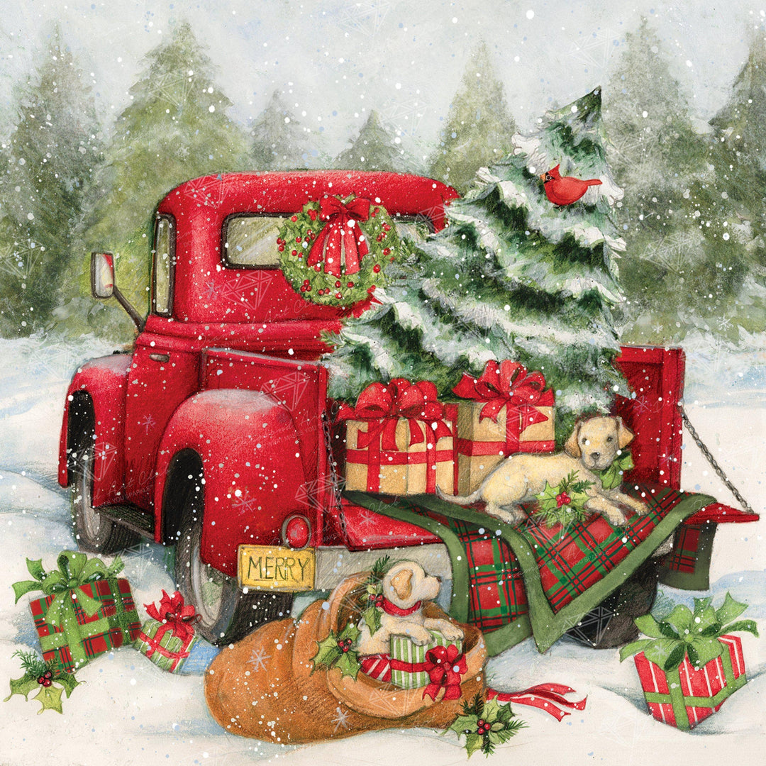 Red truck decorated for Christmas with presents and trees in a snowy scene
