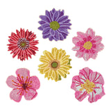 Set of colorful flower-shaped patches on a white background