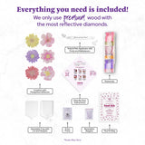 Product kit with various items including flowers, a tool kit, and other supplies on a white background.