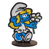 Decorative figure of a character from a cartoon, held together with small beads on a white background