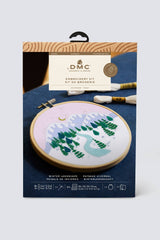 Embroidery kit packaging with DMC branding on a light gray background