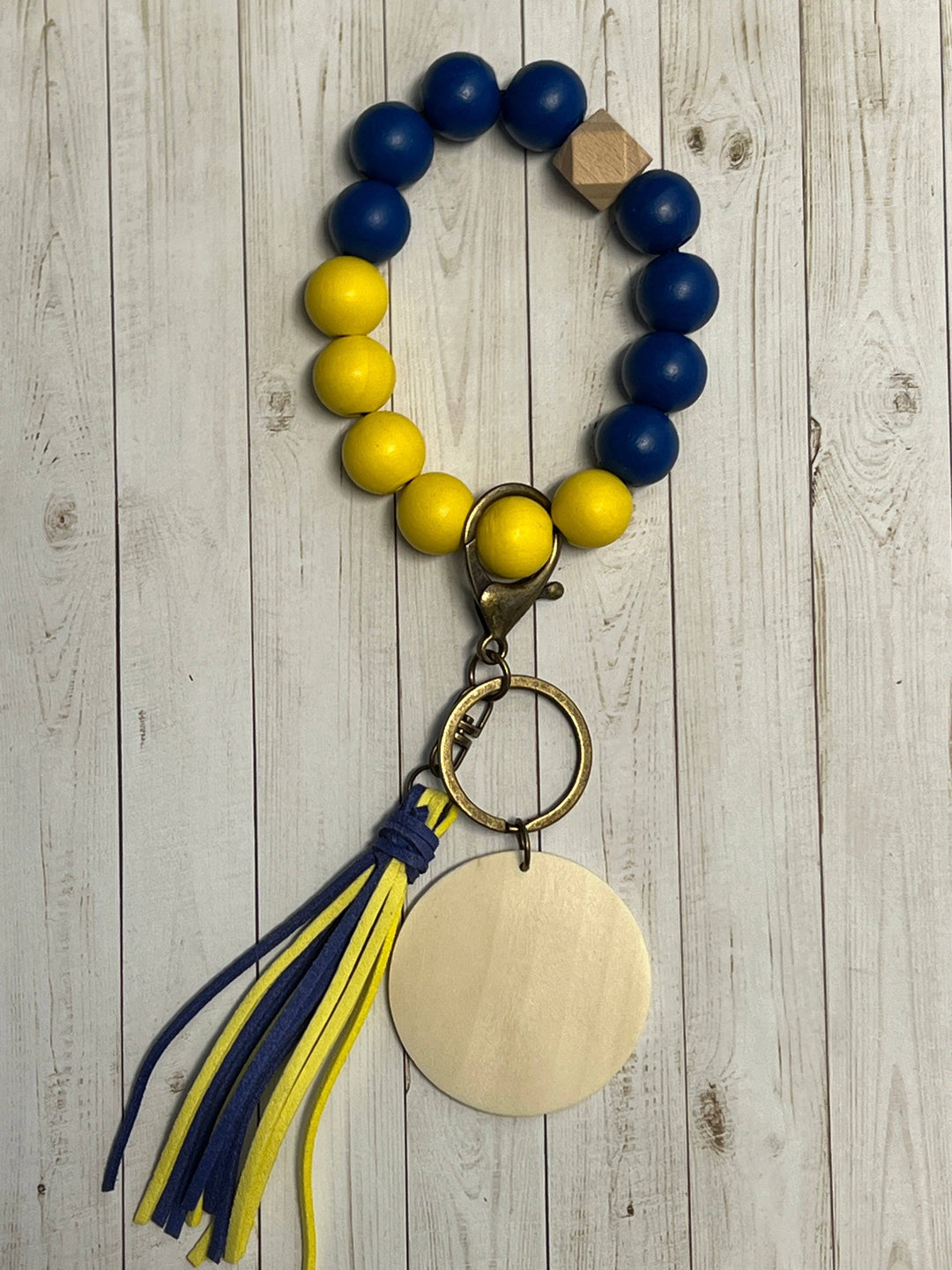 KW Laser Supplies - Royal Blue/Yellow Wristlet - Pisgah Needleworks