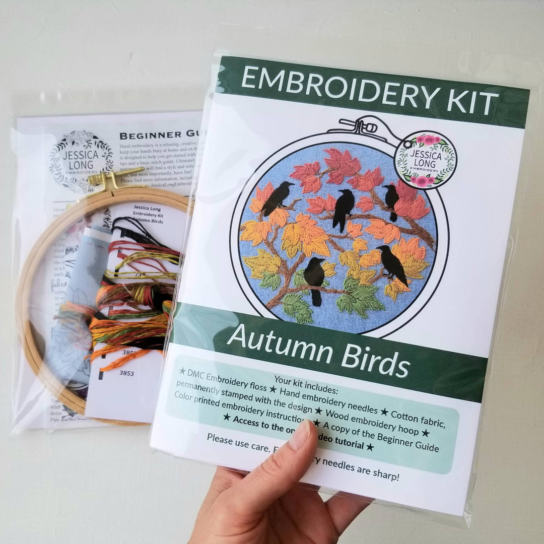 Embroidery kit with 'Autumn Birds' design on a white background