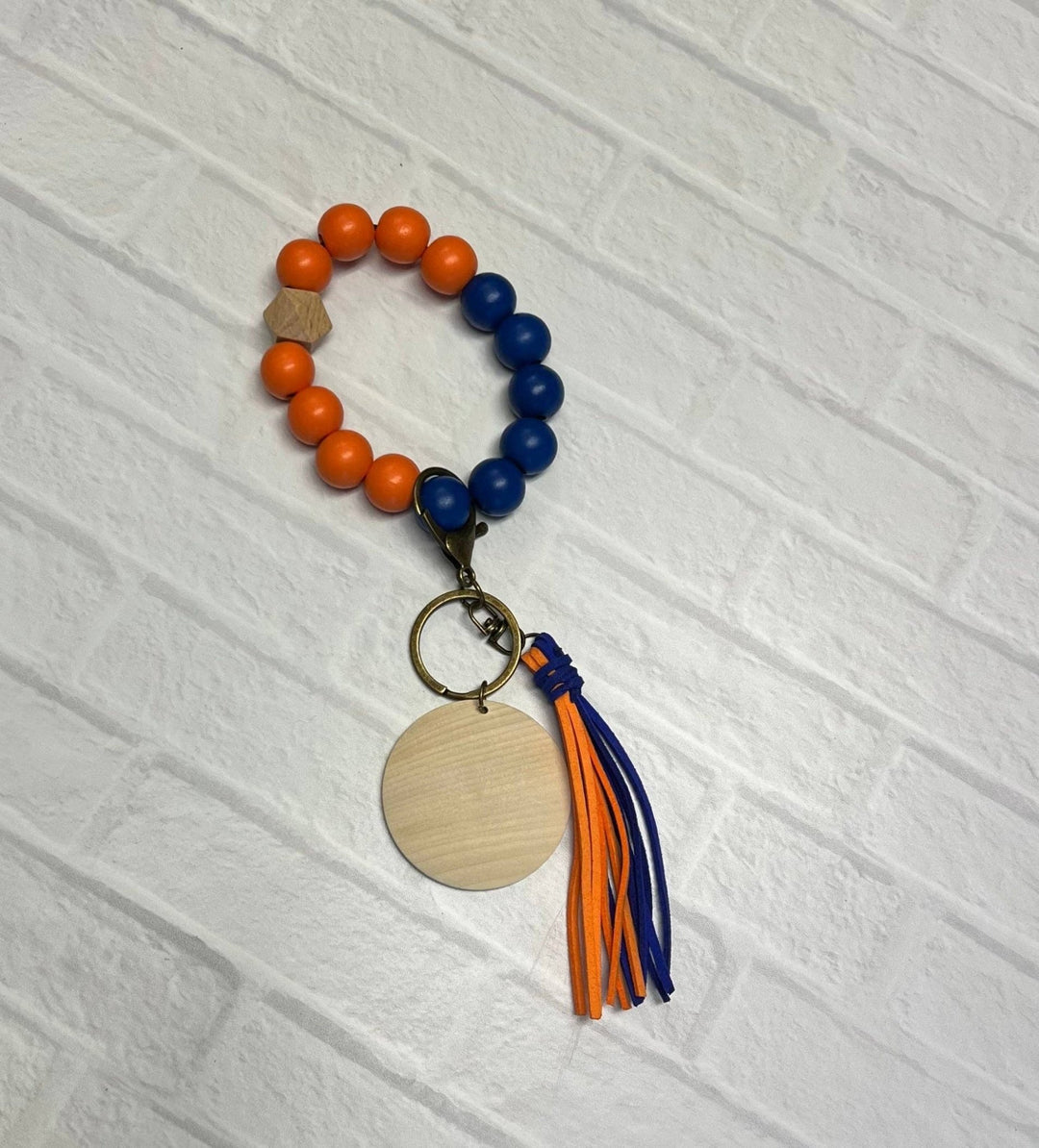 KW Laser Supplies - Royal/Orange Wristlet - Pisgah Needleworks