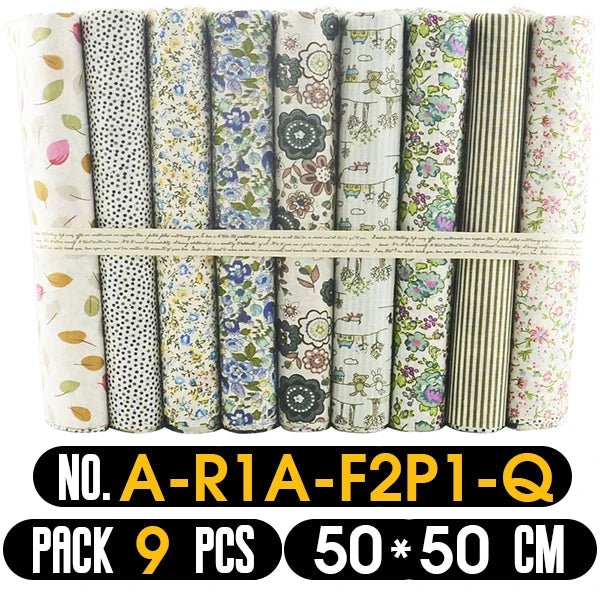 Collection of fabric rolls with various patterns tied together, labeled with product details.