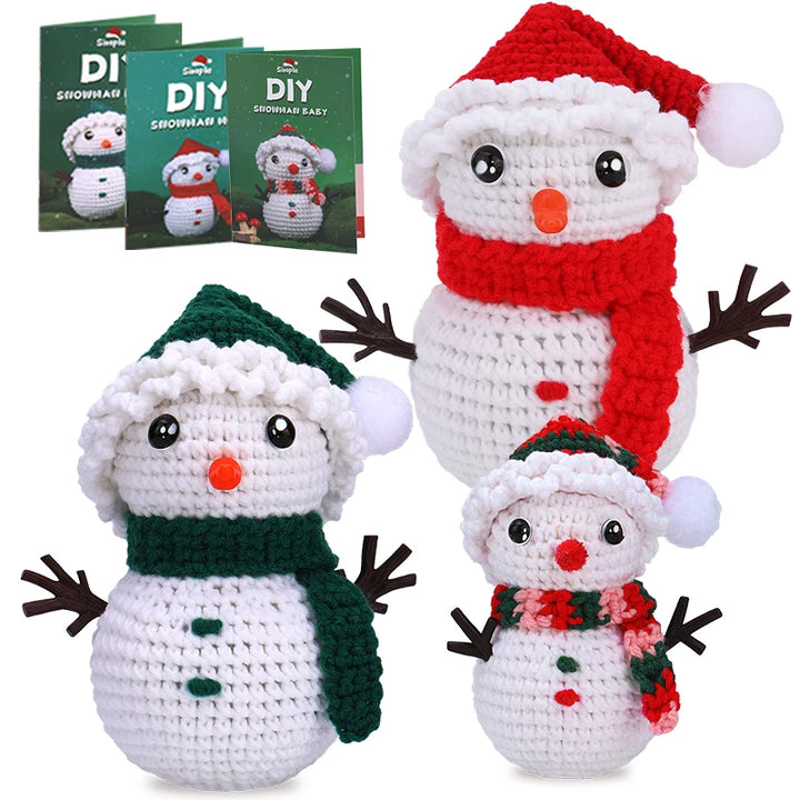 Three crocheted snowmen with different colored hats and scarves, accompanied by a set of instructions.