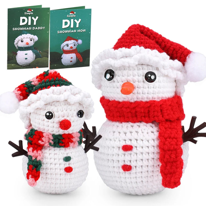 Two crocheted snowmen with red scarves and hats, and two DIY snowman guides in the background.