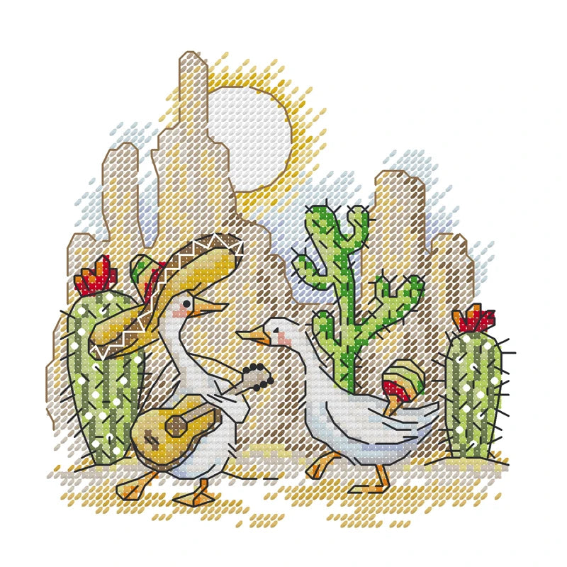 Cross-stitched design of two ducks with a guitar and cacti on a white background