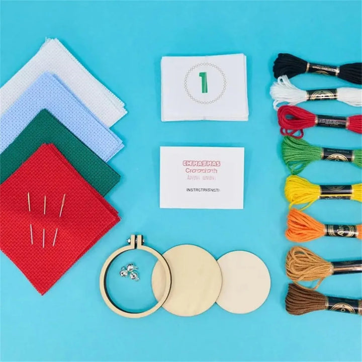 Embroidery kit with materials on a blue background