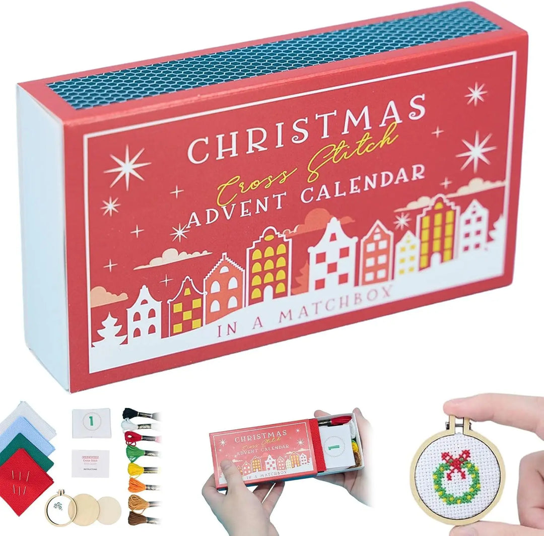 Christmas cross stitch advent calendar in a matchbox with matching box and cross-stitched wreath.