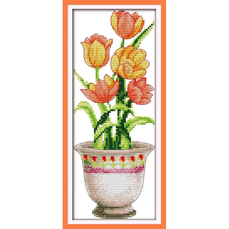 Cross-stitched design of tulips in a pot with an orange border