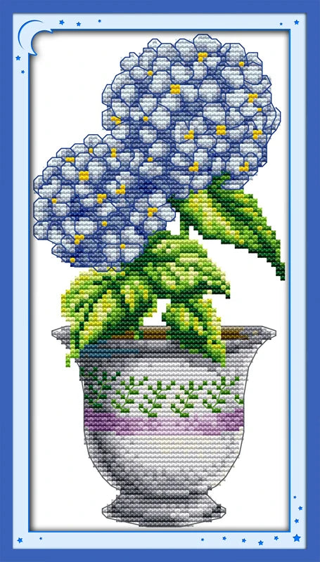Cross-stitched design of a pot with blue flowers and green leaves on a white background.