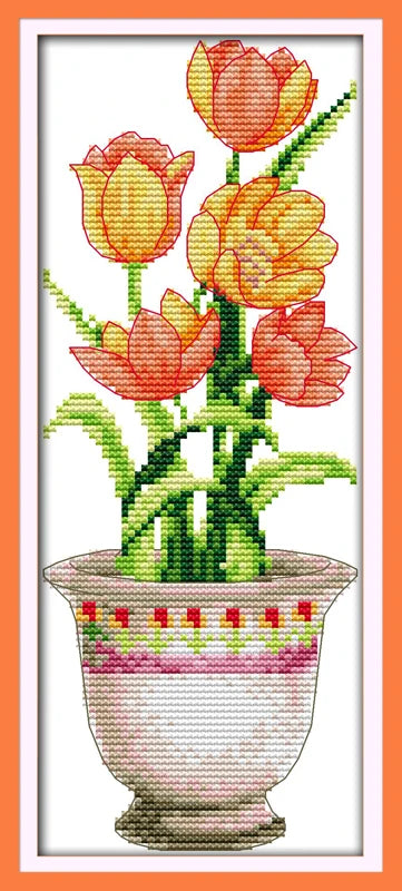 Cross-stitched design of tulips in a pot with an orange border