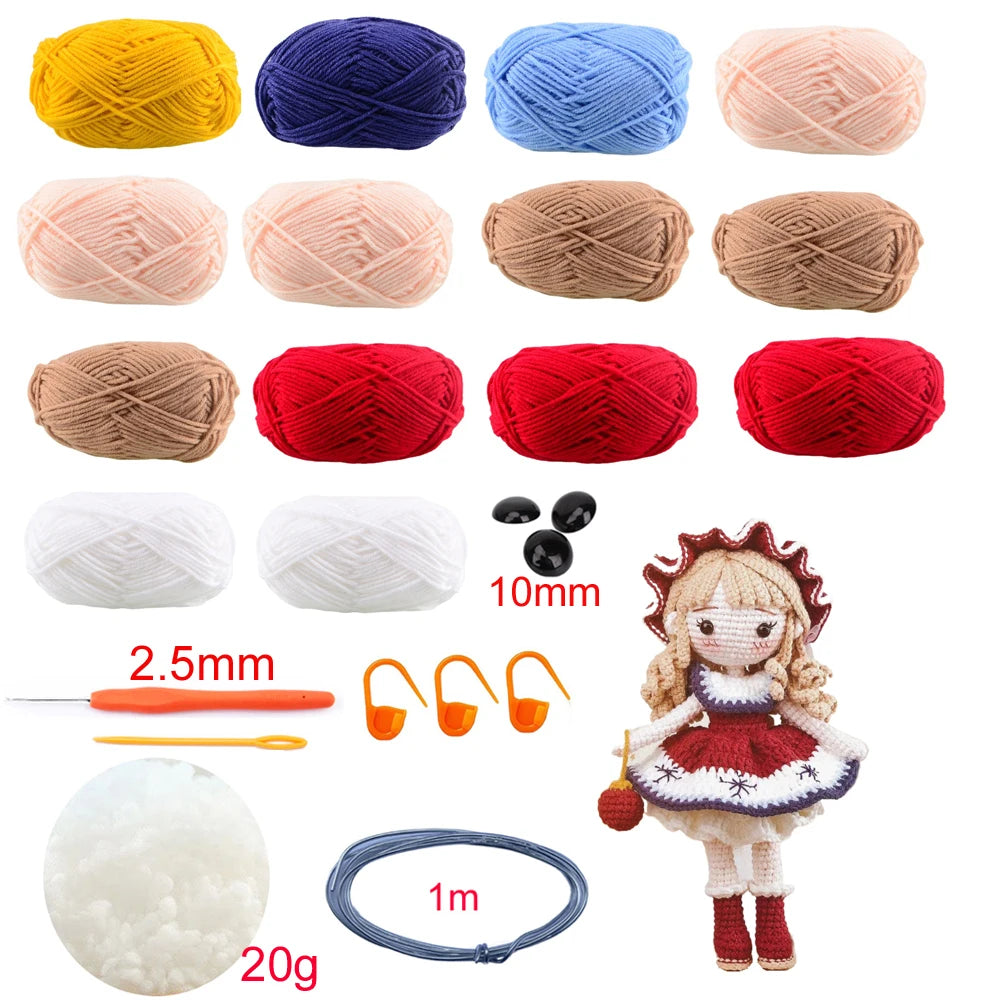 Collection of yarn balls, crochet hooks, and a small doll on a white background