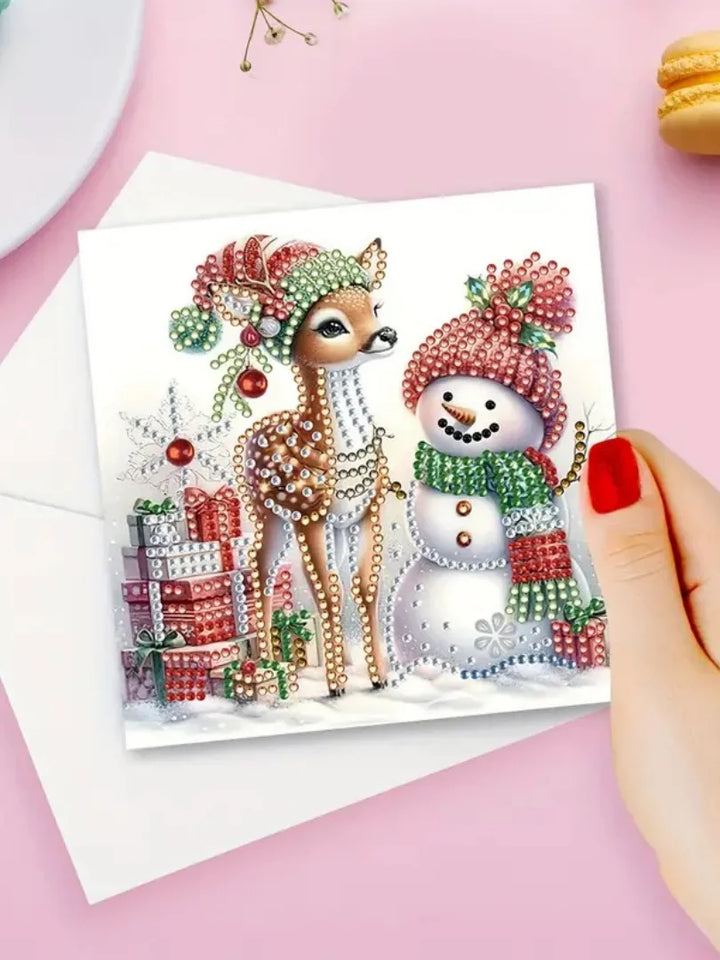 Decorative card with a deer and snowman on a pink background