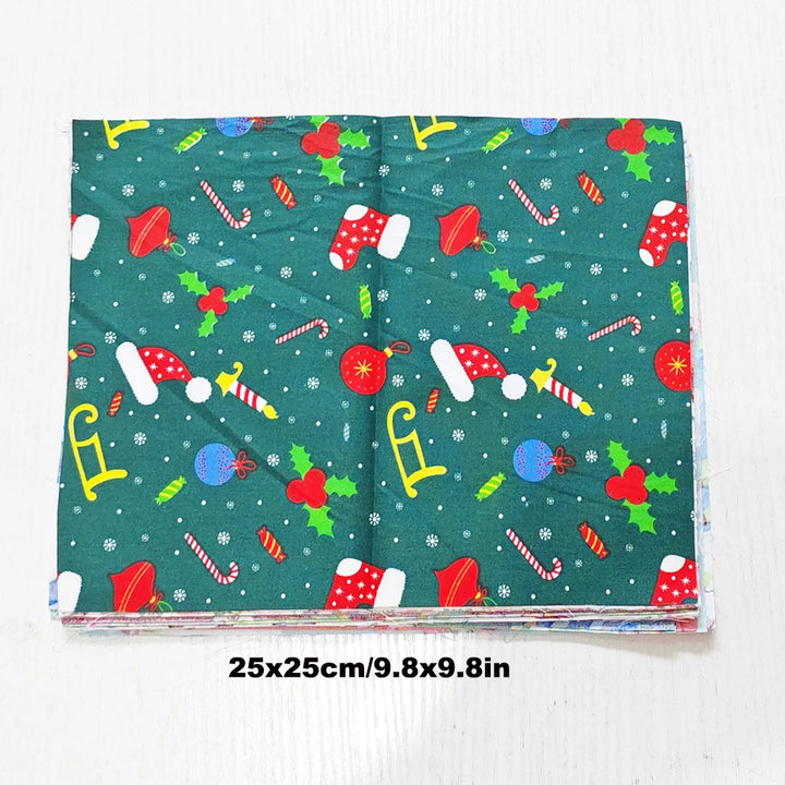Folded fabric with Christmas-themed pattern on a white background