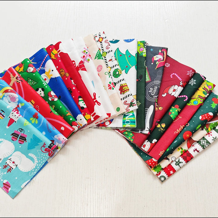 Collection of Christmas-themed fabric swatches arranged in a fan on a white background