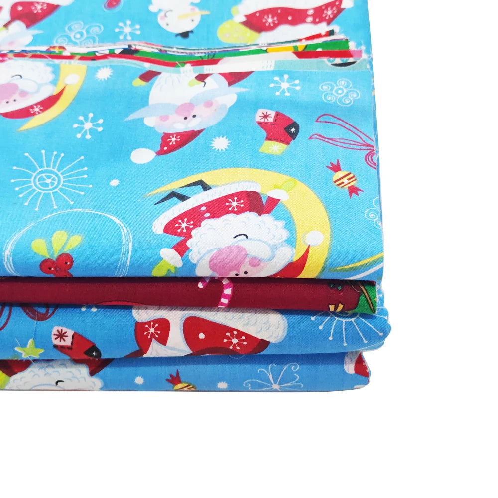 Colorful fabric with cartoon Santa Claus design on a blue background